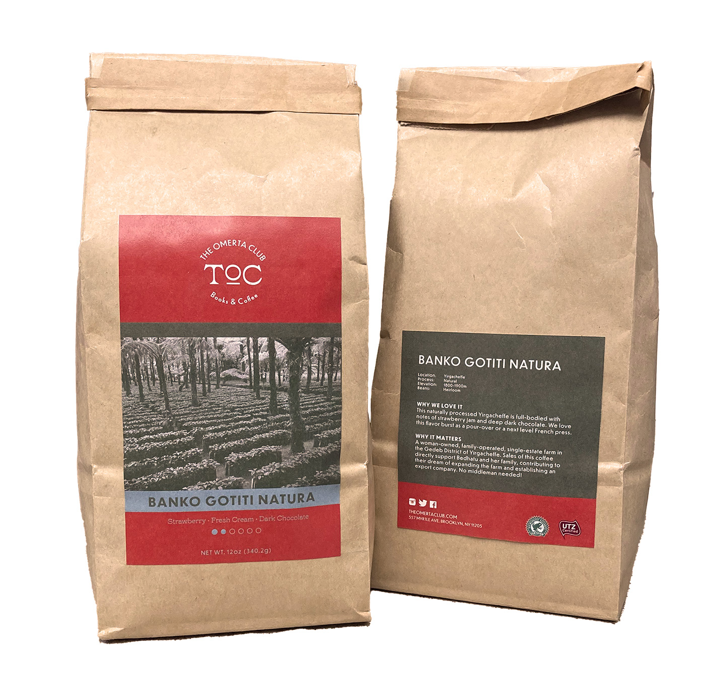 an image of two coffee bags with TOC brandingon the labels